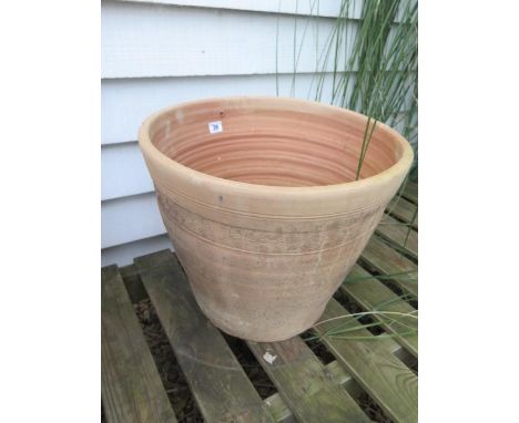 One terracotta frost proof planter, chip to side 