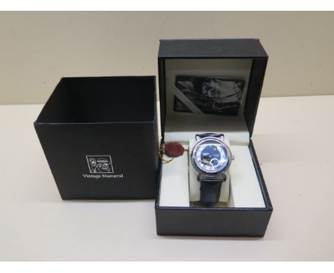 A Swan and Edgar vintage numeral automatic wristwatch boxed with card in unworn condition in working order, 42mm case 