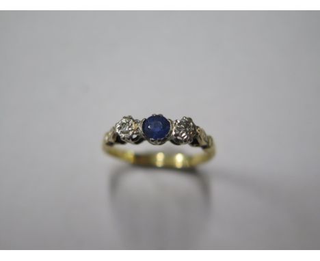 An 18ct yellow gold and platinum diamond and sapphire ring, size K, approx 2.5 grams, generally good 