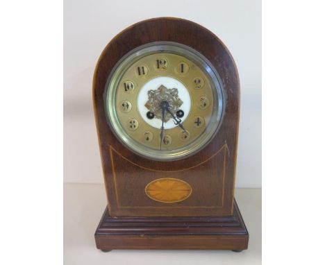 A Japy Freres Edwardian mantle clock with a medallion dial striking on a gong with key, running, case reasonably good, some m