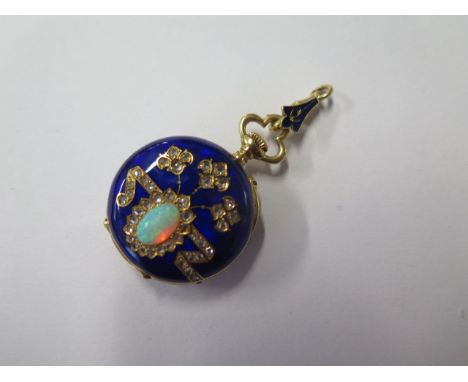 A ladies 18ct gold 24mm top wound pendant watch with blue enamel, inset with opaline diamonds, made circa 1920, 25mm case, ru