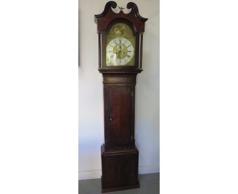 An 18th / 19th century oak and mahogany 8 day striking longcase clock with a 12" brass dial standing 87" tall, later Tempus F