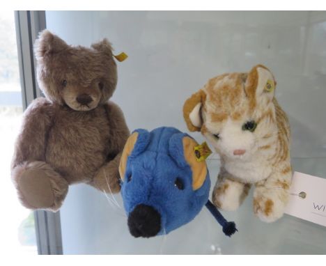 Three Steiff toys; a Steiff cosy felt blue mouse 5390/15, button and label intact; a Steiff small teddy 002205 (Knopf im ohr)