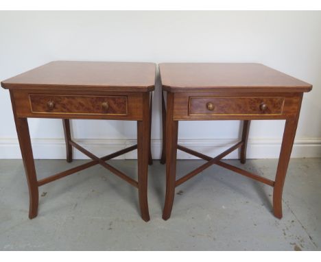 A pair of burr wood veneer lamp tables each with a drawer on splayed legs united by cross stretchers, made by a local craftsm