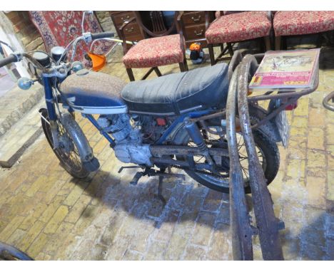A Honda 125cc vintage motorcycle reg XOD 59K in need of restoration, no documentation or key, with a manual . Part of a decea