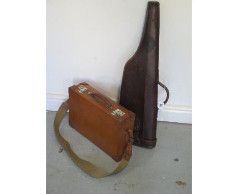 A vintage leather leg o mutton gun case, 79cm long, with a fitted leather case with shoulder strap 