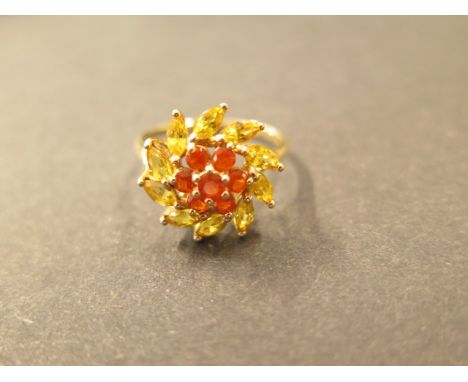 A 9ct yellow gold fire opal and citrine ring, size S 1/2, hallmarked, head approx 18mm, in good condition 