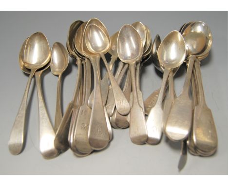 A large collection of George III and later silver flatwares to include stuffing spoons, table spoons, etc, various dates and 