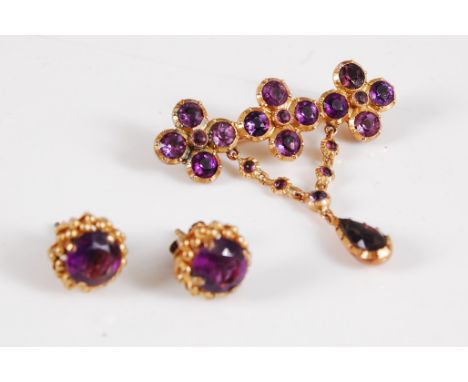 A pair of 9ct amethyst earrings, 7mm diameter, in beaded mounts with posts stamped 375, together with a foil backed amethyst 