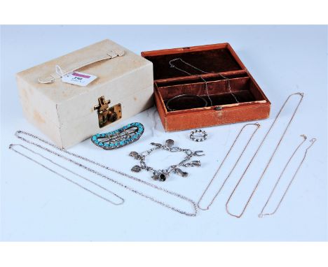 Two small jewel boxes and a small quantity of jewellery to include a turquoise cabochon buckle, a wreath brooch, a charm brac