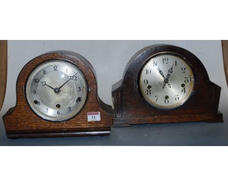 A 1930s oak cased mantel clock, having a silvered dial with Arabic numerals and chiming movement; together with another simil