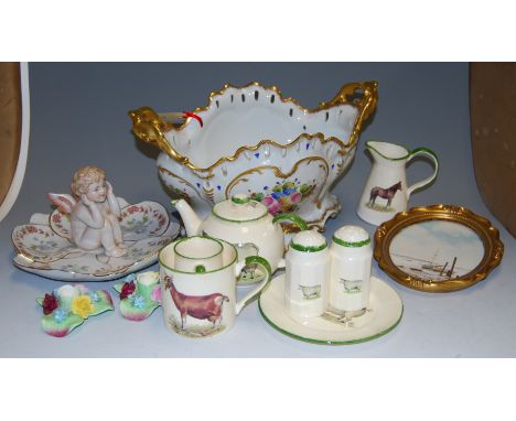 A box of mixed chinaware, to include porcelain mantel clock, table centrepiece etc (some a/f)