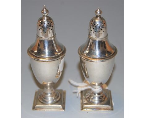 A pair of early 20th century silver pedestal pepperettes by Horton &amp; Allday