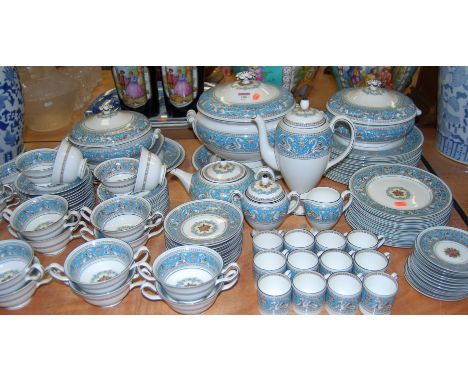 A Wedgwood twelve place setting coffee, dinner and tea service, in the Florentine pattern.Both meat plates with light knife m