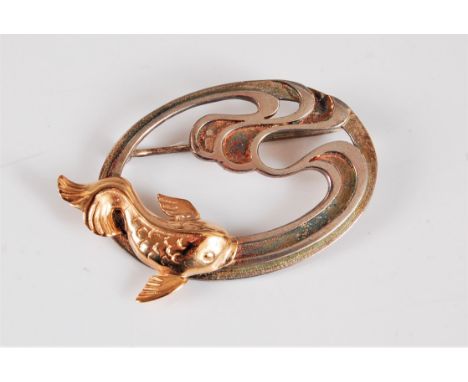 A silver gilt fish brooch, the koi style fish swimming along an oval with swirls of water, hallmarked to reverse London, 2000