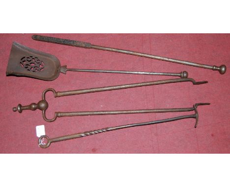 A set of 19th century steel fire tools, to include shovel, tongs and poker