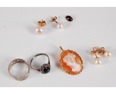 A pair of 9ct gold cultured pearl earstuds, each approx. 6.7mm diameter, and a with an 18ct mounted cameo pendant(3g), togeth