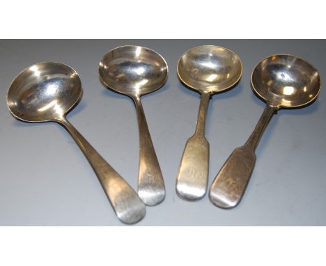 A pair of 19th century silver sauce ladles, in the fiddle pattern, together with one other pair of 19th century silver sauce 