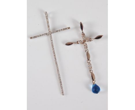 Two silver and gemset cross pendants, the first set with a single line of round white stones, stamped 925, 8cm long, together