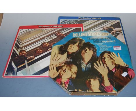 Two Beatles LPs,The Beatles 1962-1966, and 1967-1970; together with a Rolling Stones Through the Past Darkly LP (3)