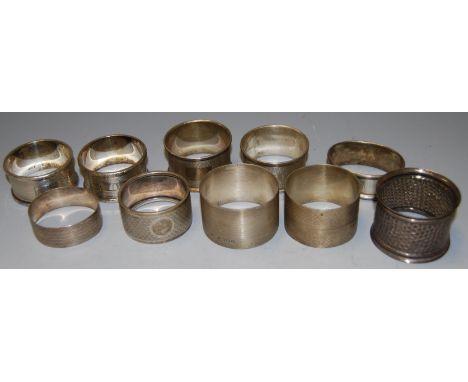 A collection of ten Edwardian and later silver napkin rings, 6.9oz