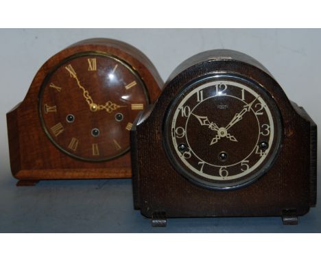 A 1950s Smiths Enfield oak cased mantel clock; together with a walnut cased mantel clock (2)