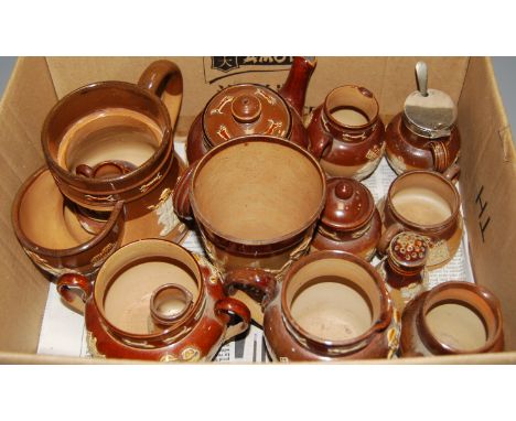 Assorted Doulton Lambeth salt glazed stonewares to include beaker, miniature teapot, various cream jugs, table salt, etc