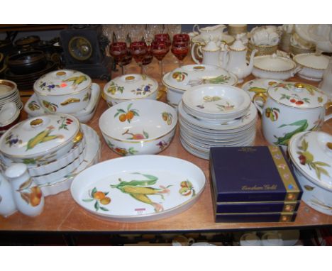 A large collection of Royal Worcester over-to-table wares in the Evesham pattern, to include dinner plates, tureens and cover