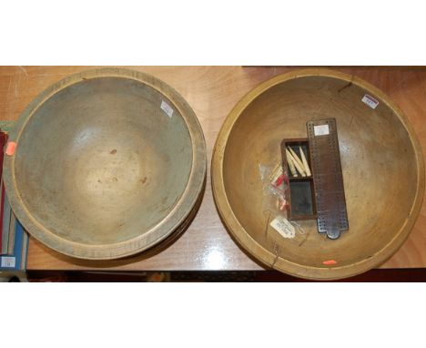 Three turned softwood bowls, the largest dia. 42cm; together with a mahogany cribbage board with bone markers
