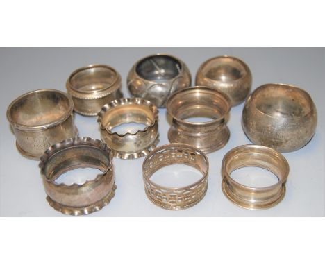 A collection of ten Victorian and later silver and white metal napkin rings