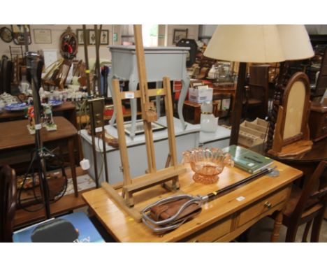 A table top easel stand; a shooting stick; an Art Deco glass bowl