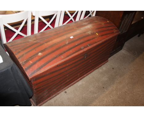 A large painted pine domed top trunk