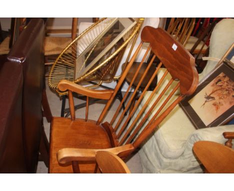 A stick back rocking chair