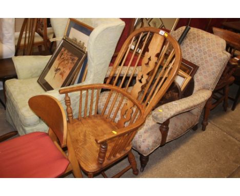 An elm seated stick back Windsor chair