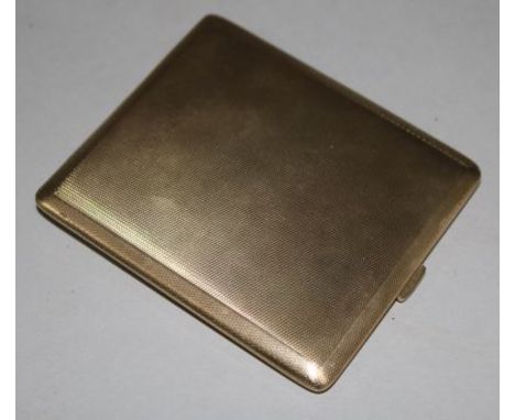 A 1940's engine turned 9ct gold cigarette case, 3.75in.