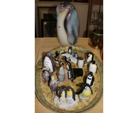 A collection of ceramic penguins
