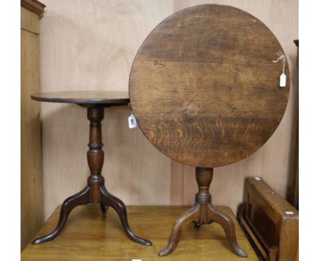 Two George III oak tripod tables, W.66cm H.53cm