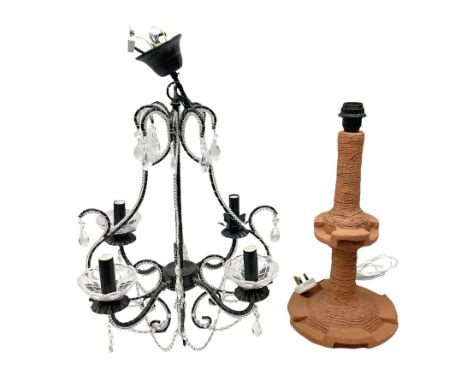 Terracotta studio pottery lamp base with carved detail and geometric knop and base, H45cm, together with a black chandelier w
