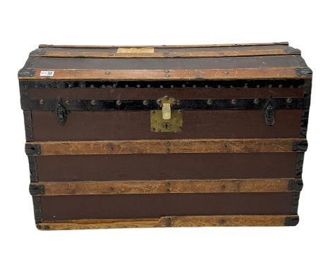 Early 20th century wood and metal bound dome top travelling trunkDimensions: Height:&nbsp;60cm&nbsp; Length/Width:&nbsp;87cm&
