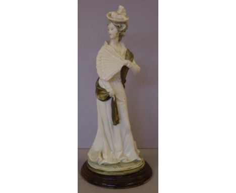 Naples porcelain lady figurine signed B. Merli to base, on timber stand, H32cm approx