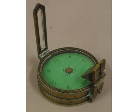 Vintage brass compass dial reads W. MacDonnell & Co. Sydney