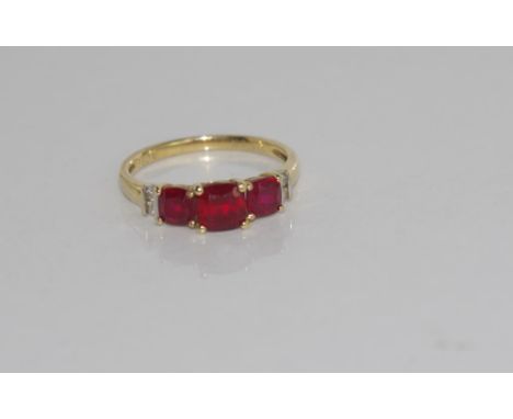 9ct yellow gold and ruby ring (synthetic rubies) with 2 diamonds at each shoulder, weight: approx 1.7 grams, size: M/6