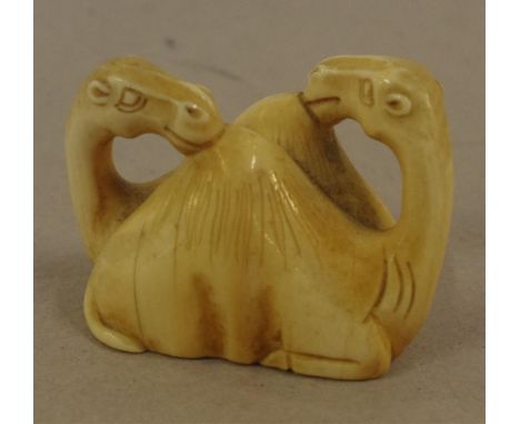 Antique carved ivory camel netsuke circa 1920s, H3cm approx