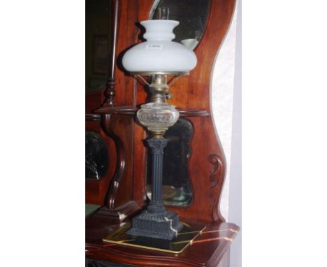 Antique oil lamp with milk glass shade, 53cm high approx.