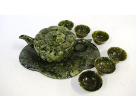 Carved green stone teaset consist of teapot, stand and 6 cups