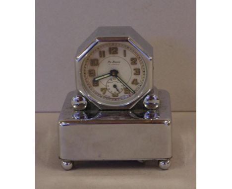 Chrome Swiss desk clock with musical movement, 9cm high approx.