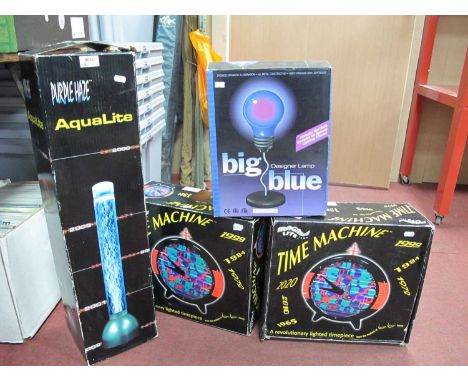 Magma Lite Time Machine light up clock x2, Purple Haze Aqua Lite lamp and a Big Blue Designer Lamp, all boxed, untested sold 