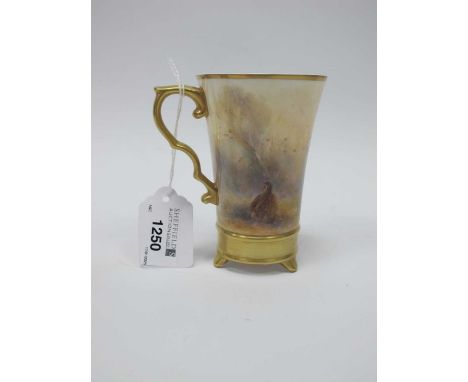 Milwyn Holloway Handpainted China Mug, featuring game birds, with gilt handle and base, signed and dated 1990, 11cm high.Some