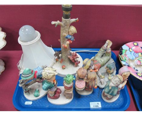 A Hummel Pottery Table Lamp Base "Culprits", on circular base, 23cm high, four Hummel figures and a Capo di Monte figure of b
