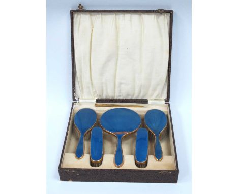 An Antique Style Guilloche Enamel Dressing Table Set, comprising hand mirror, clothes brush and hair brush, (enamel damages),